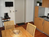 Old string factory - blue apartment 1 - satellite TV with DVD player and radio and kitchen cart