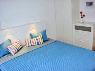 View into the sleeping area of apartment 1